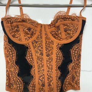 SKIMS Orange and Black Bustier